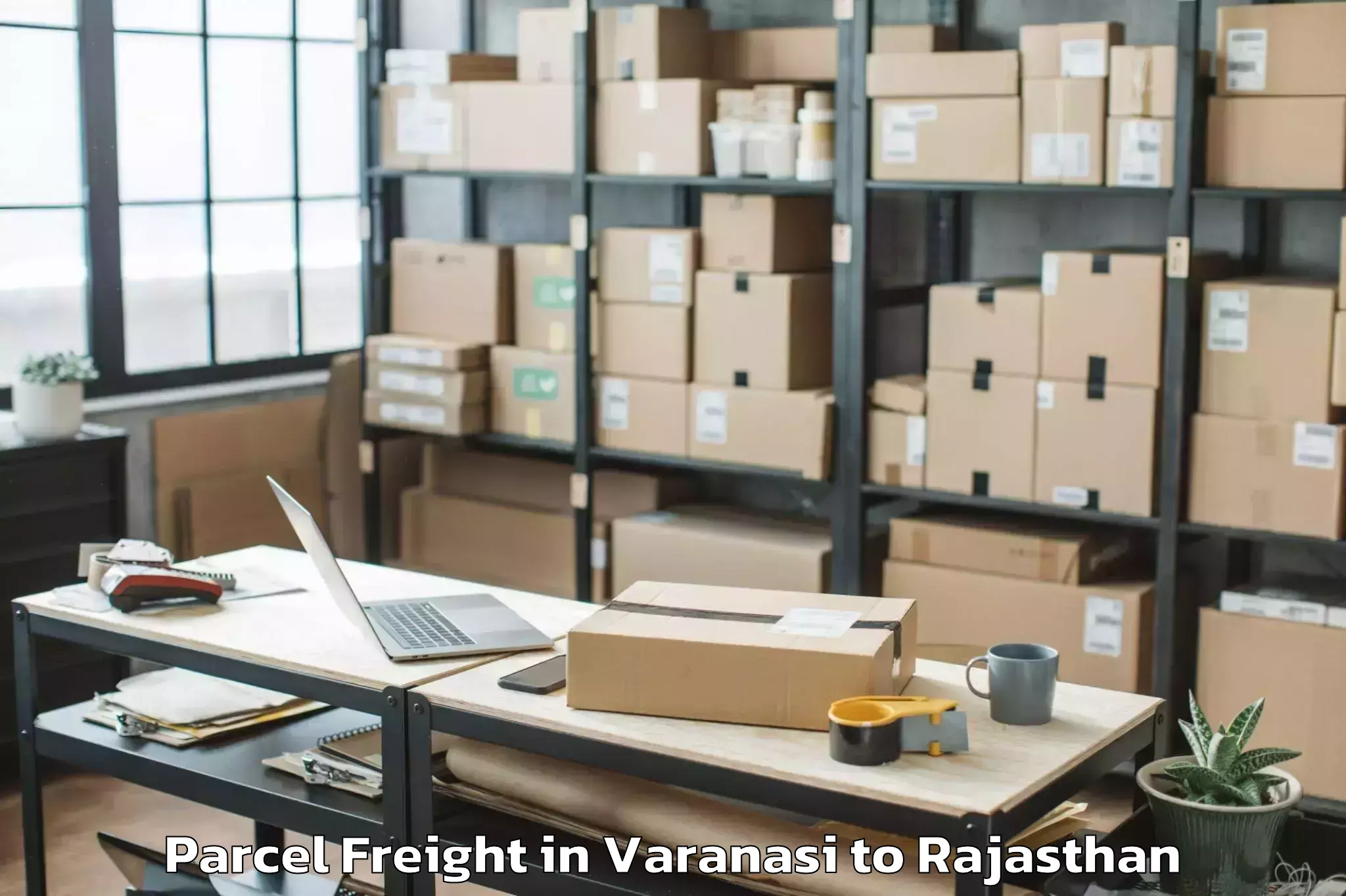 Book Varanasi to Lakheri Parcel Freight